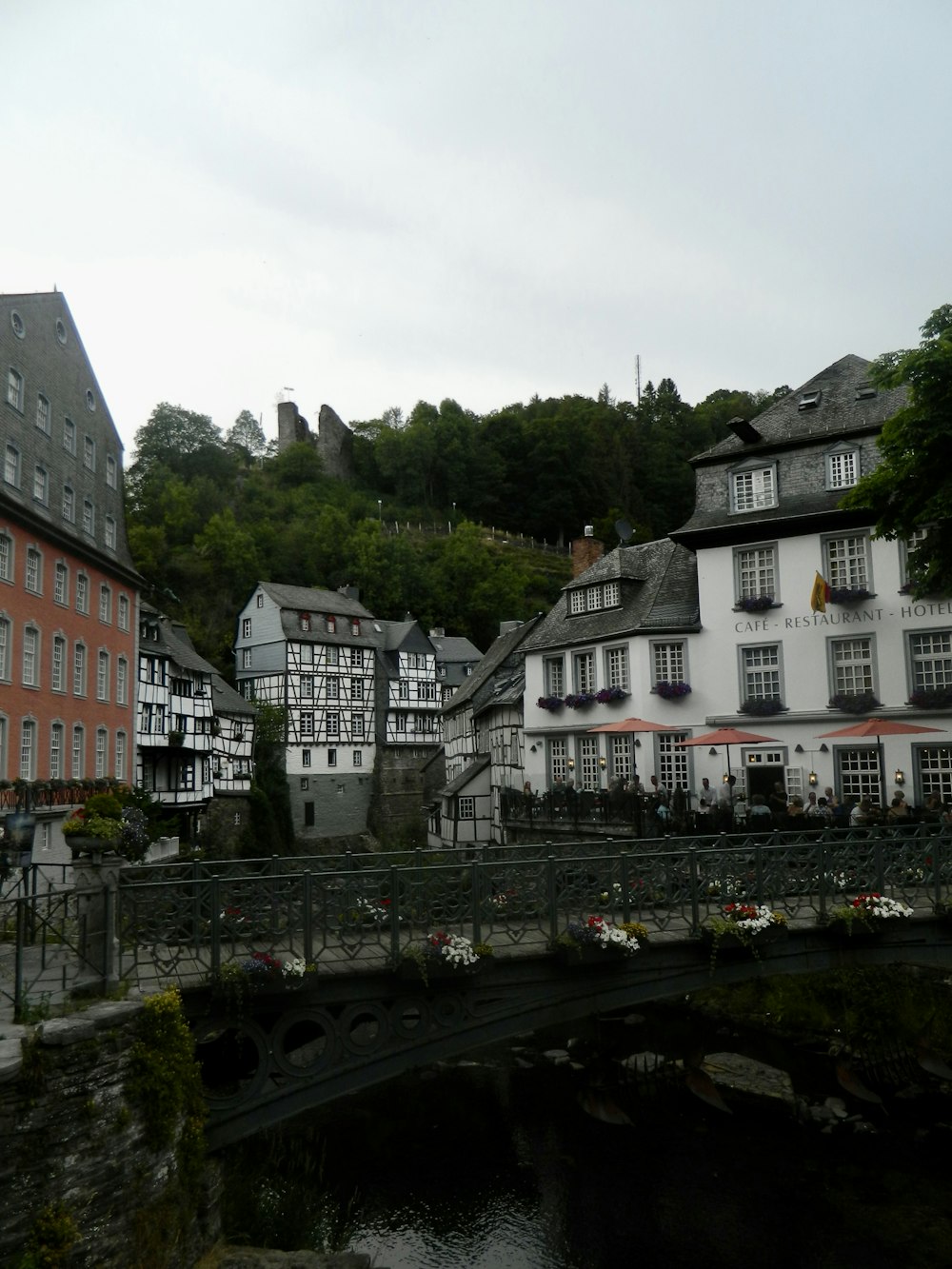 a bridge over a river in a small town