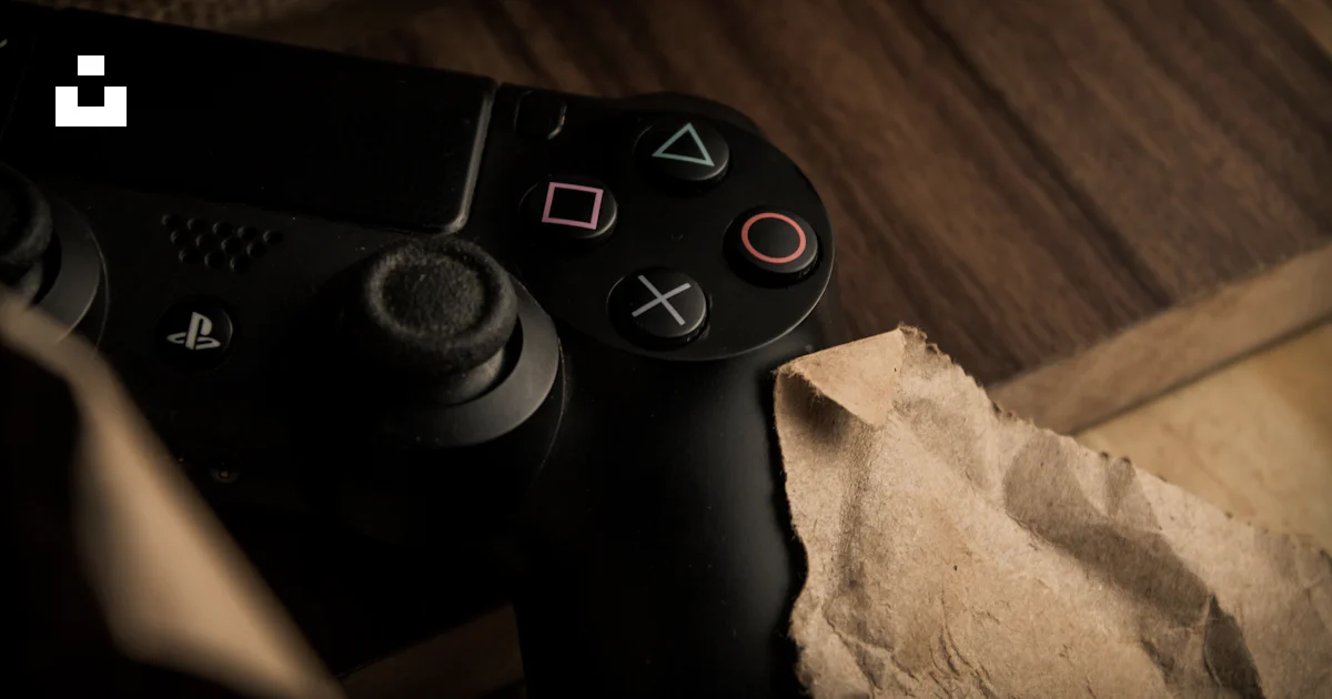 A close up of a video game controller photo – Free Controller Image on ...