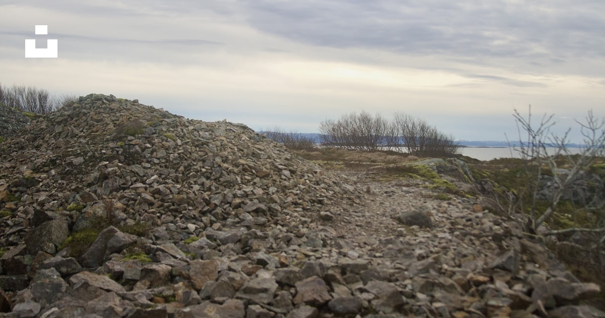 A rocky path with grass and rocks on the side photo – Free Norway Image ...