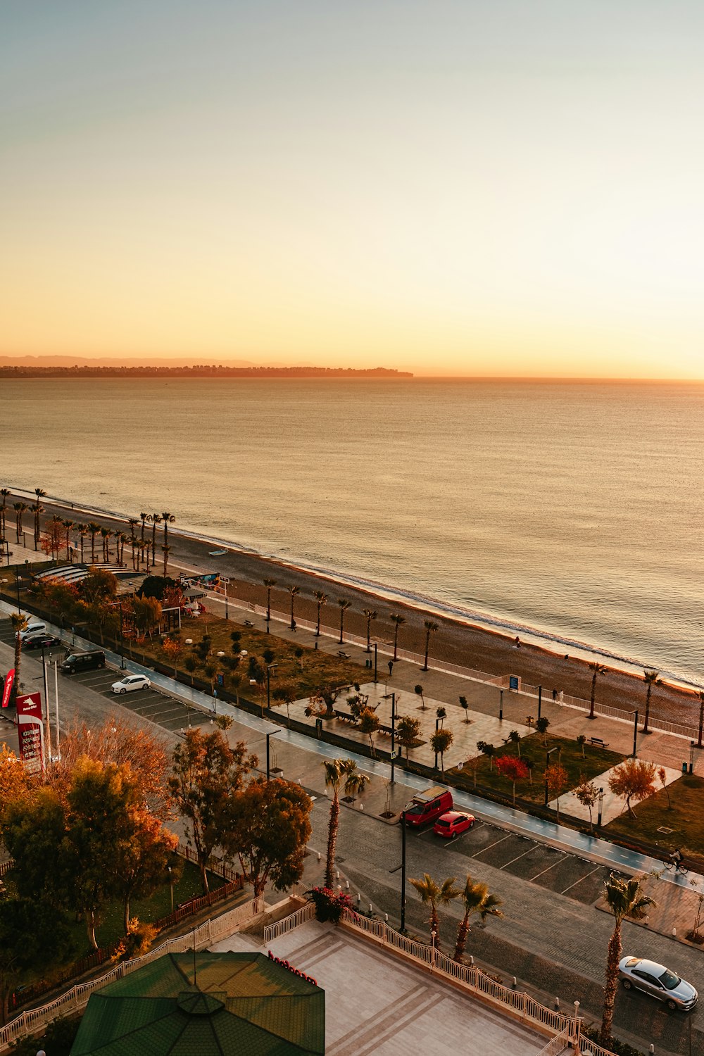 a view of a beach from a hotel room