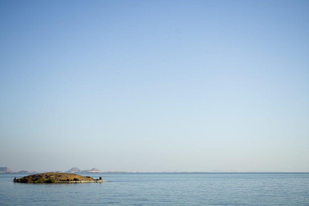 a small island in the middle of a large body of water