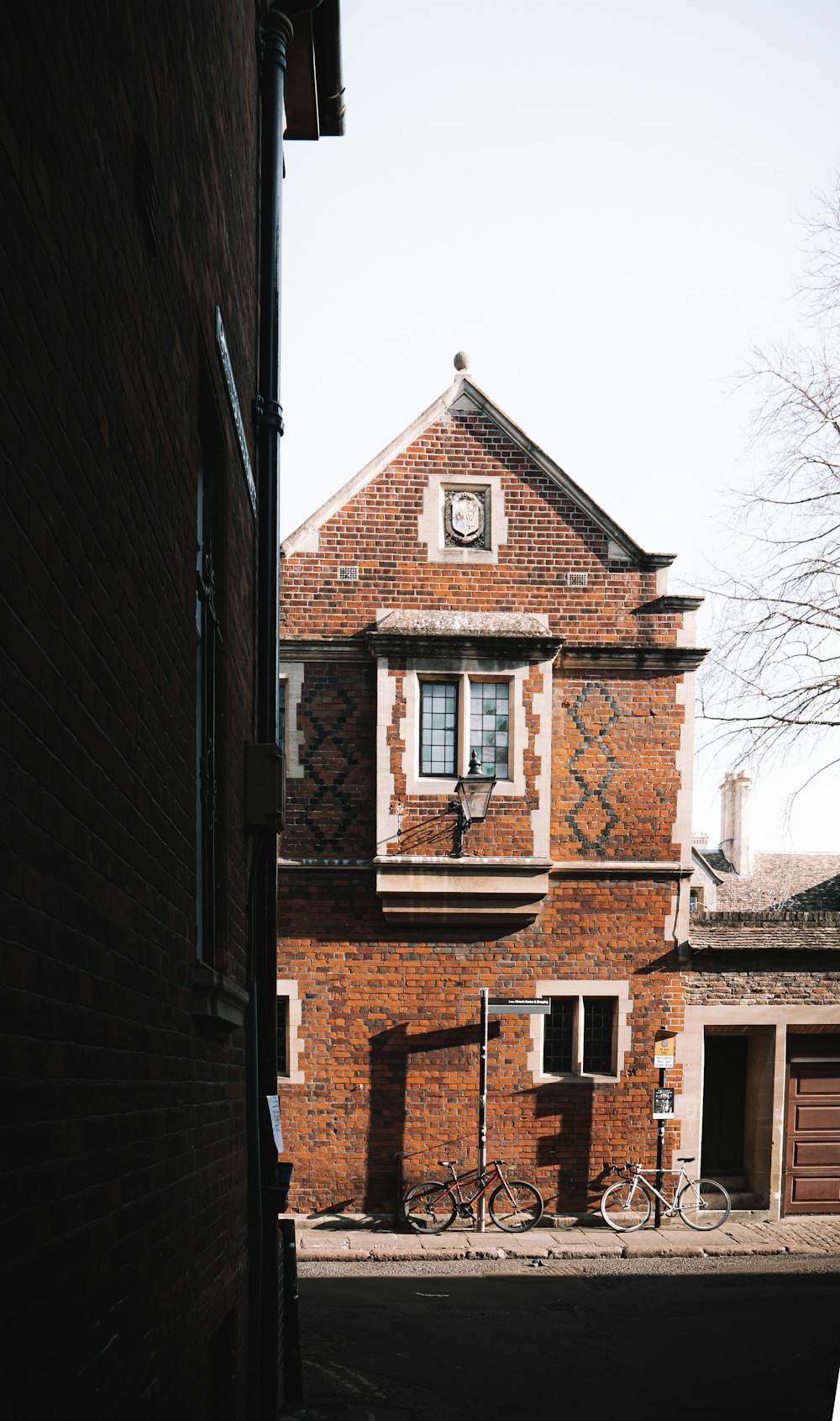 a brick building with a clock on the side of it