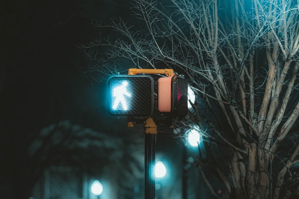 a traffic light sitting on the side of a road