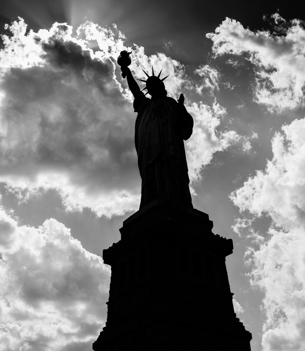 a black and white photo of the statue of liberty