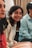 A smiling woman sharing her positive experience.