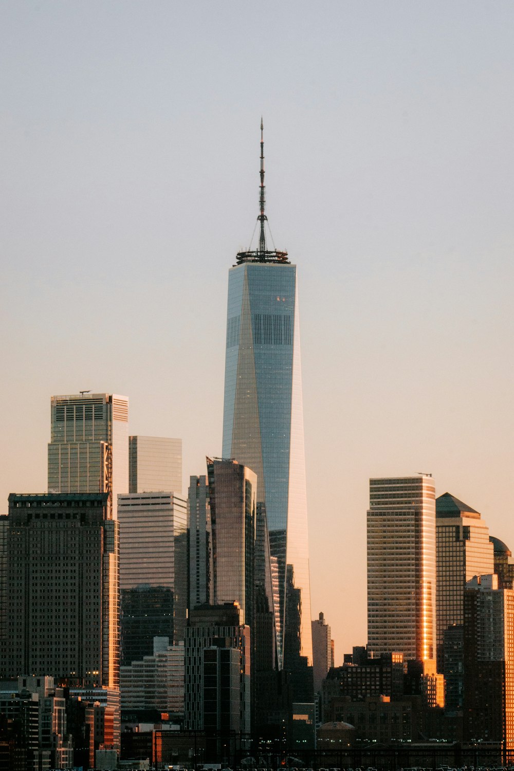 a view of a very tall building in the city