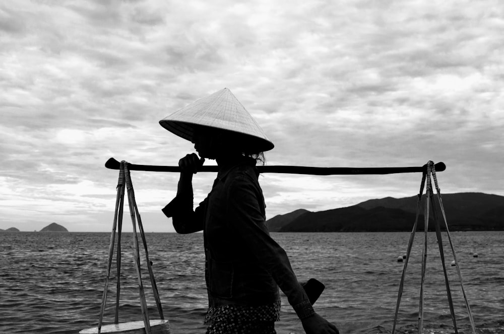 a person on a boat with a hat on his head