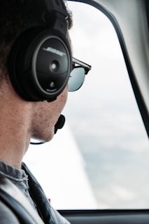 A lifestyle shot of a pilot wearing aeroboots during a flight.