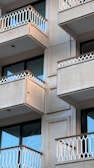 A beautifully installed balcony safety net in a modern apartment.
