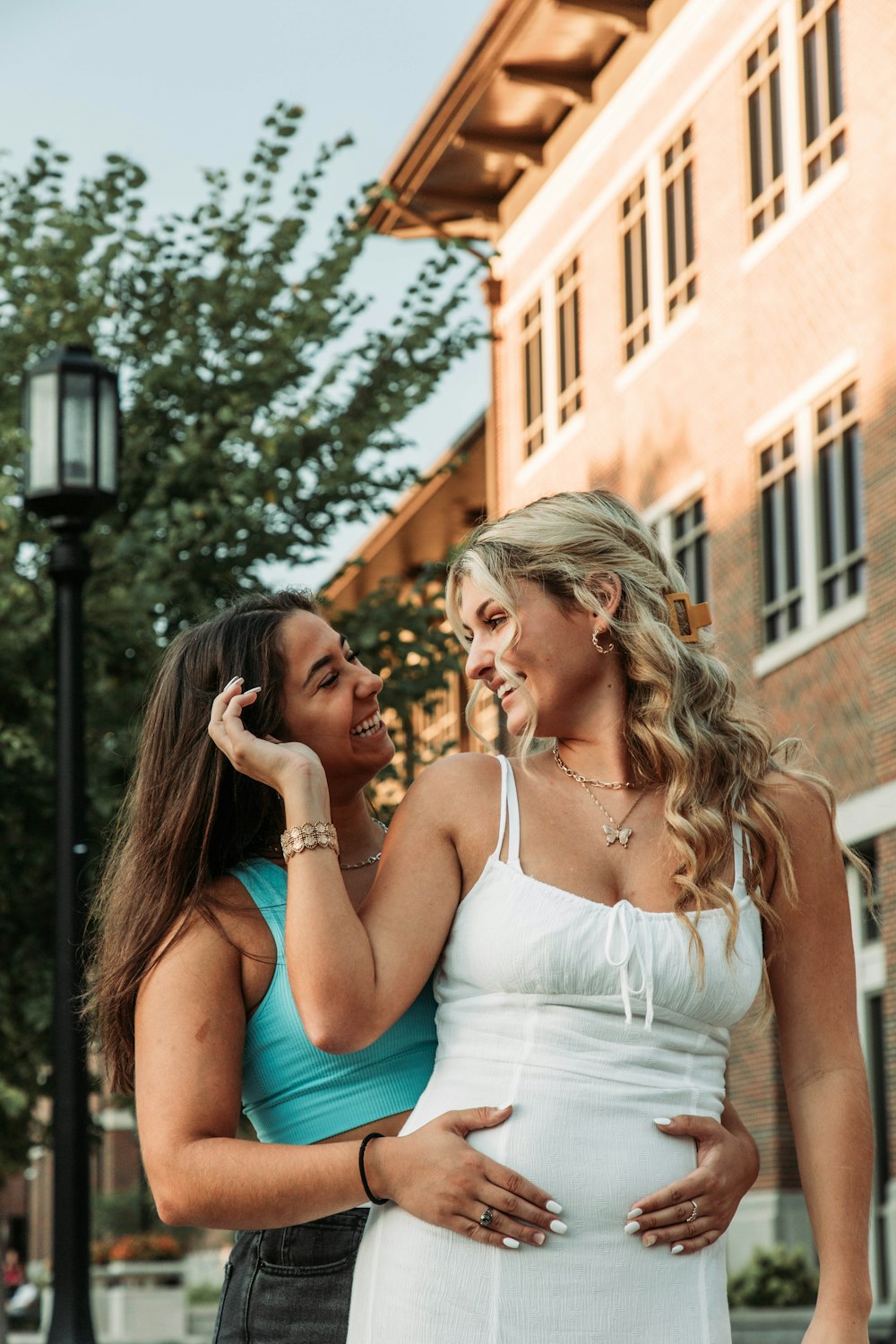 a couple of women standing next to each other