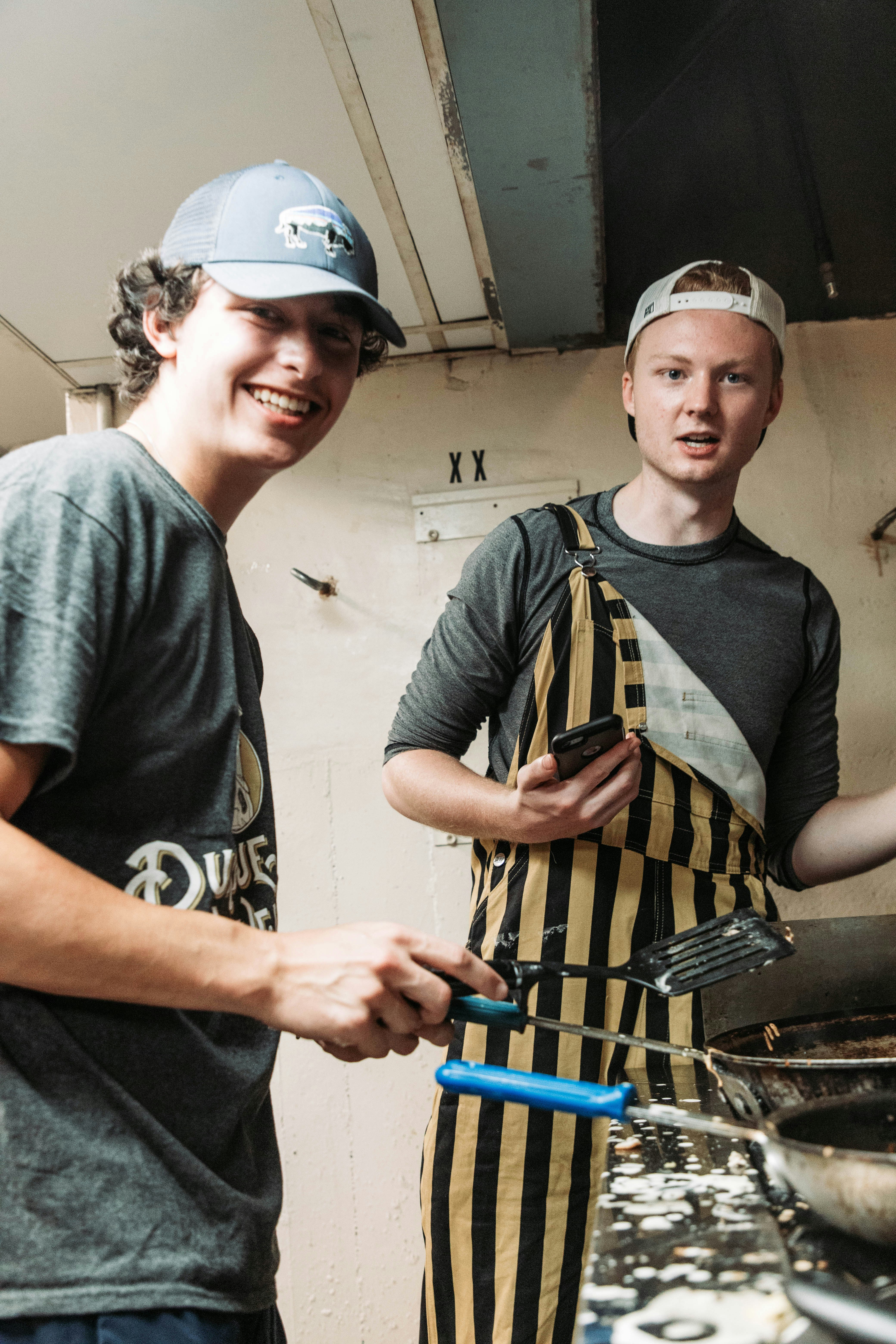 a couple of men standing next to each other