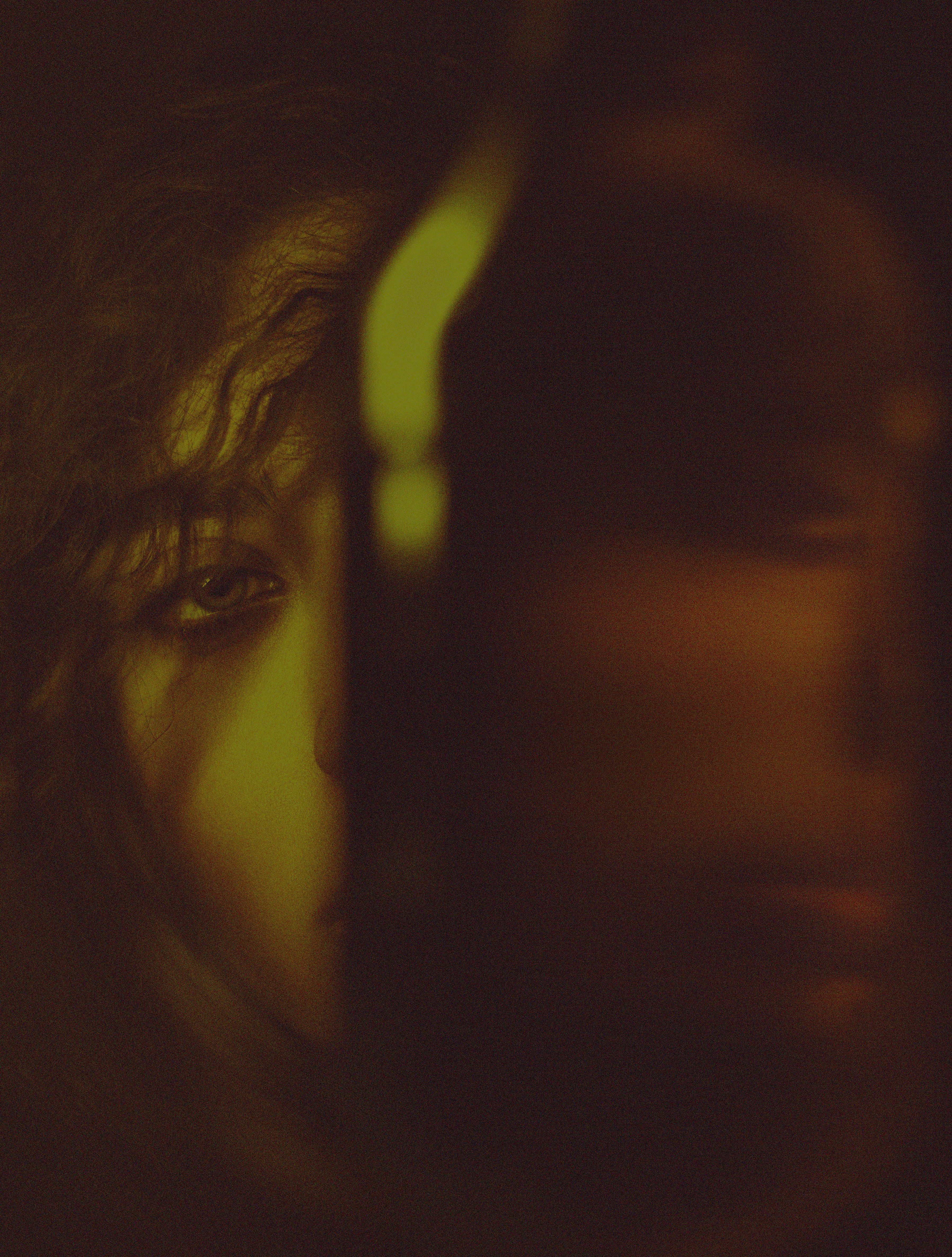 a blurry photo of a woman's face