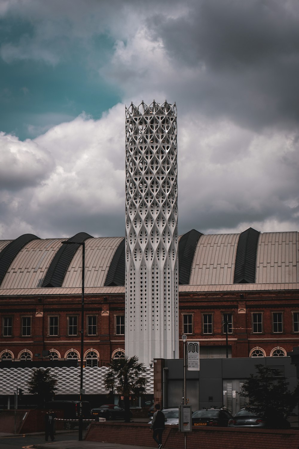 a very tall building with a very tall clock on it's side