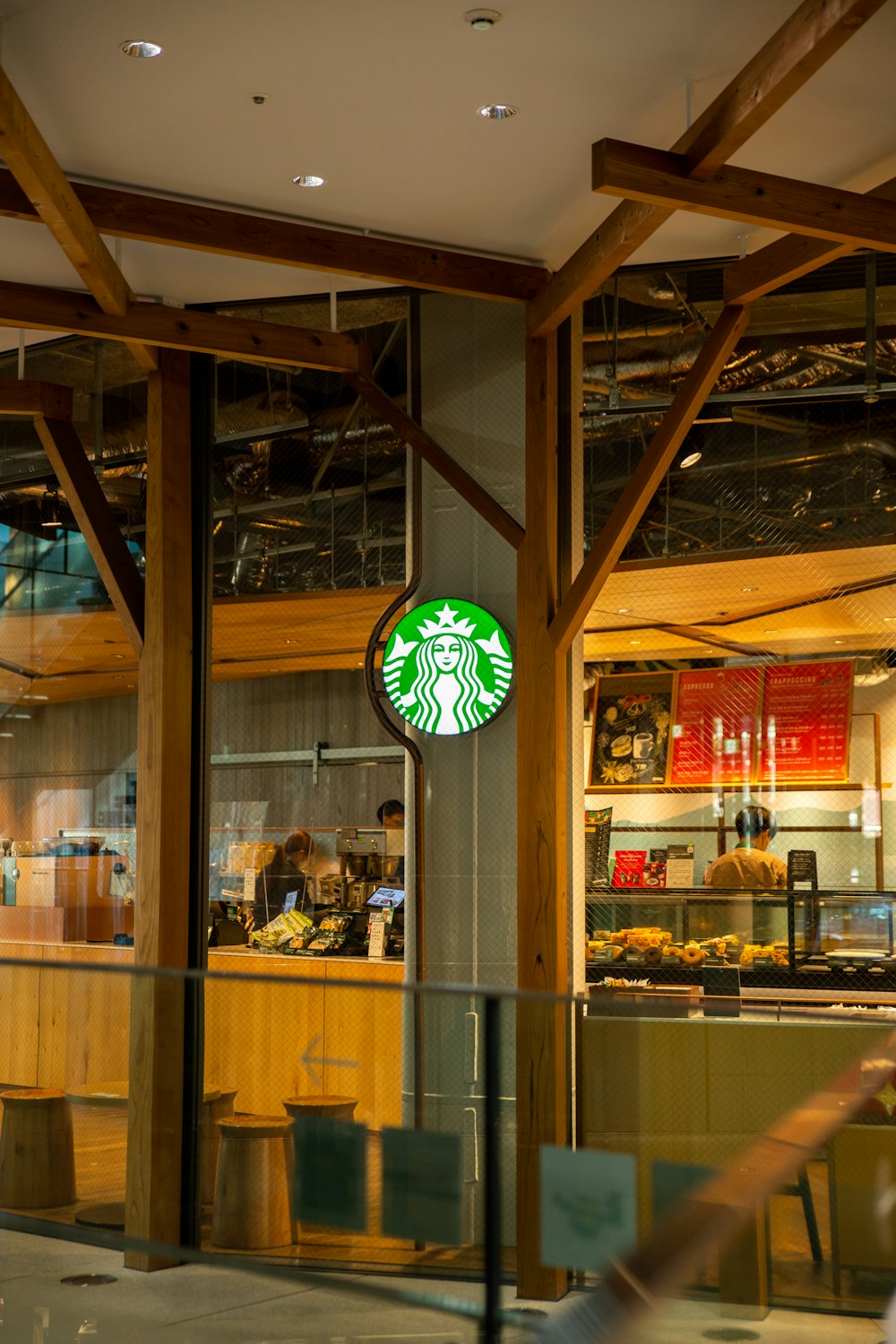 a starbucks sign in front of a restaurant