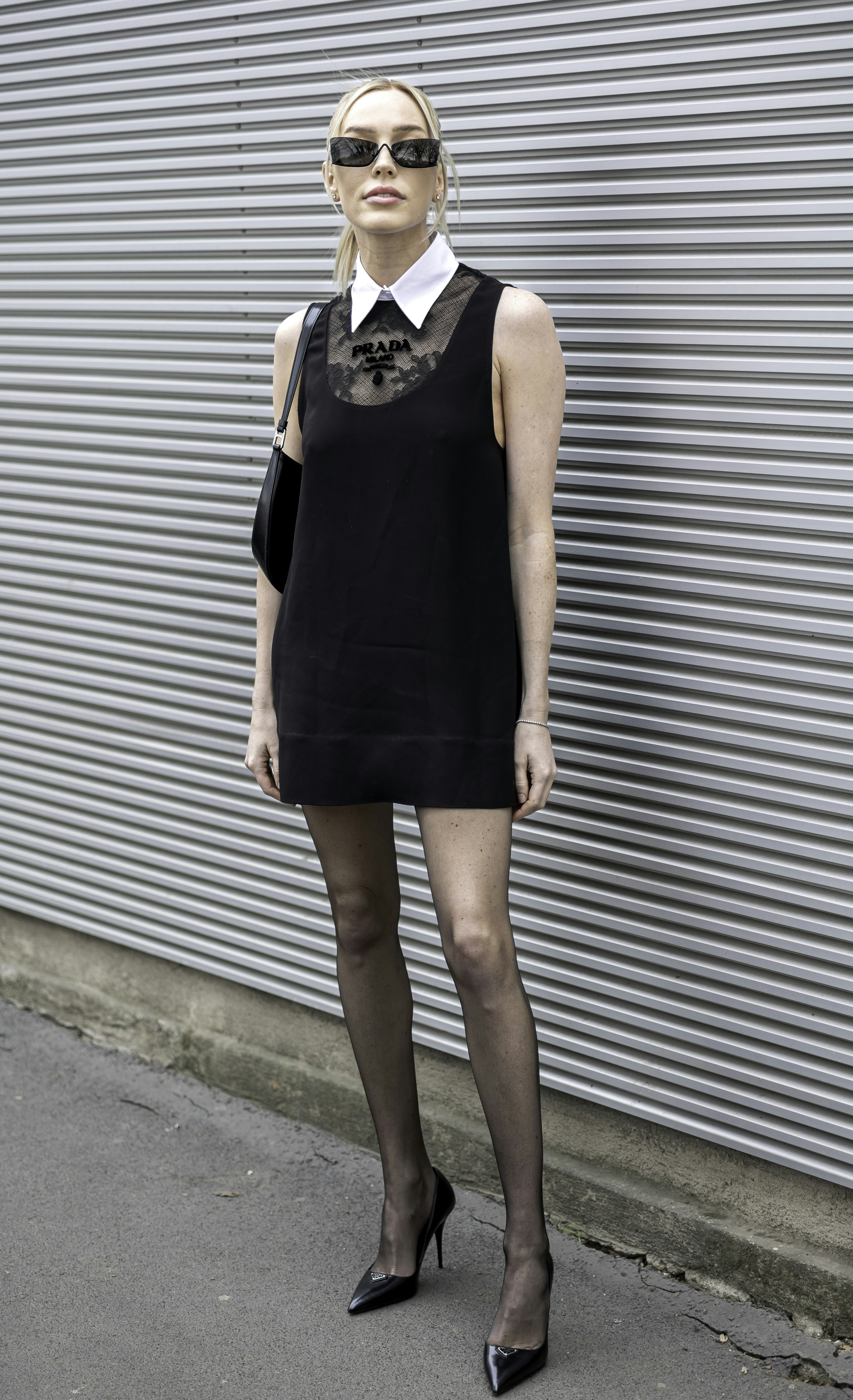 A woman wearing a black dress and black heels photo  Free Fashion Image on  Unsplash
