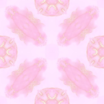 A symmetrical pattern featuring pastel pink and gold elements, resembling abstract shapes and floral motifs. The design is soft and delicate, evoking a sense of elegance and harmony.
