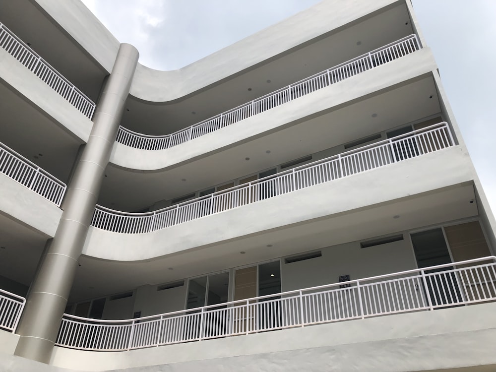 a tall building with balconies and balconies on each floor