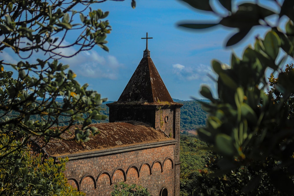 a church with a cross on the top of it