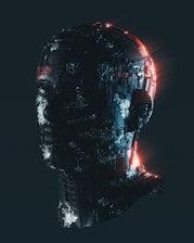 a man's head with a glowing light coming out of it