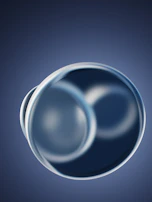 Close-up of a 3D sphere with liquid-like reflections and neon gradients swirling inside.