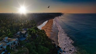 A vibrant sunrise over the famous Cabo Branco beach in João Pessoa