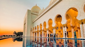 A vibrant 360° virtual tour snapshot of a historic Srinagar mosque bathed in golden evening light