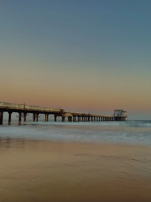 Fishing pier stretching into the Bay of Bengal