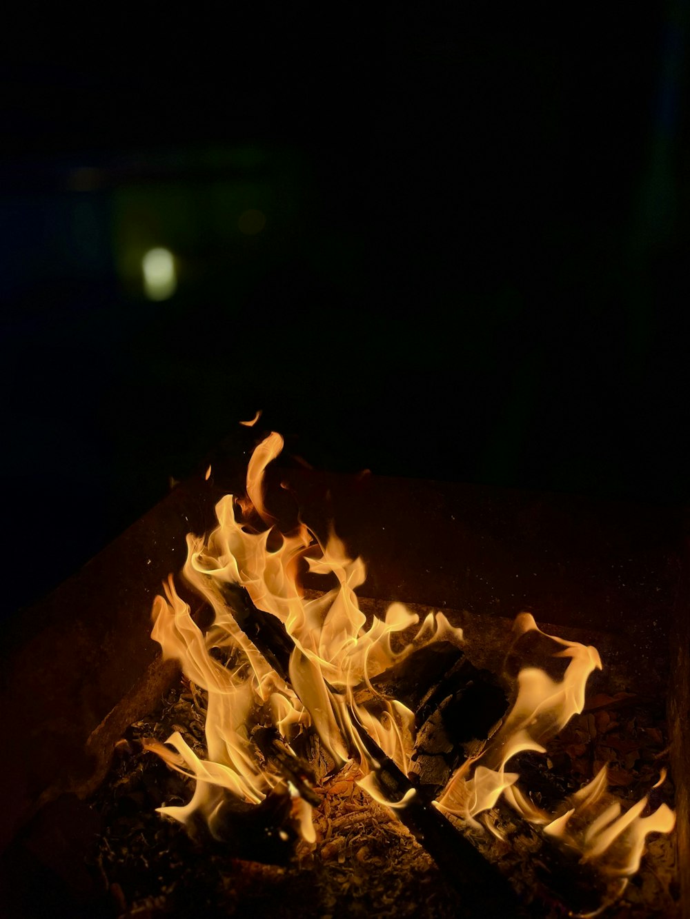 a close up of a fire in a grill