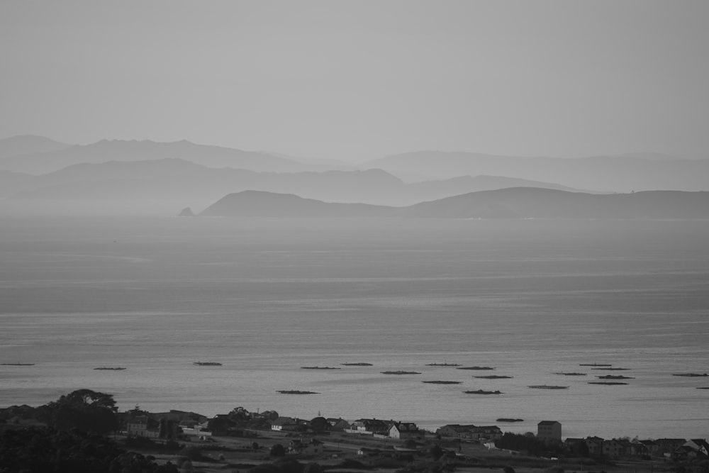 a black and white photo of a large body of water