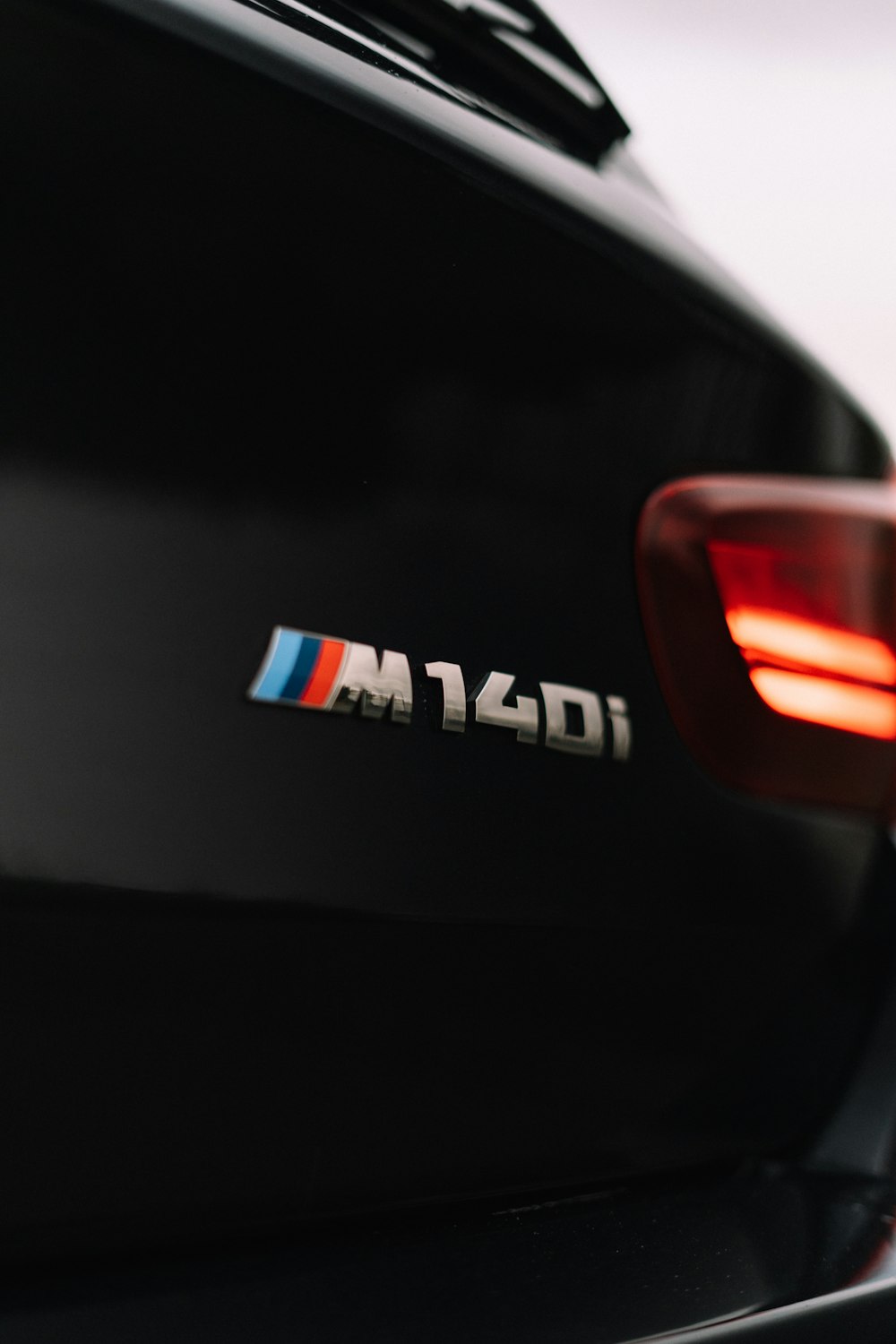a close up of a bmw logo on the back of a car
