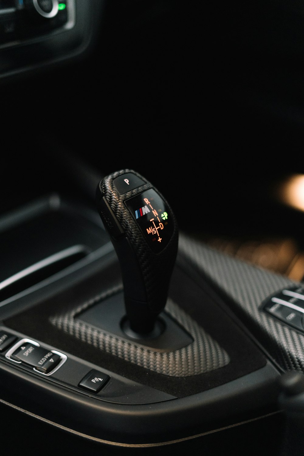 a close up of a gear stick in a car