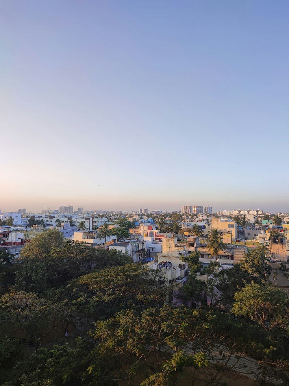 a view of a city from a hill