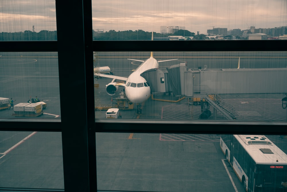 a large jetliner sitting on top of an airport tarmac