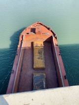 a large cargo ship in the middle of the ocean