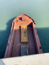 A marine consultant assessing damage on a vessel.