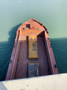 A marine consultant assessing damage on a vessel.