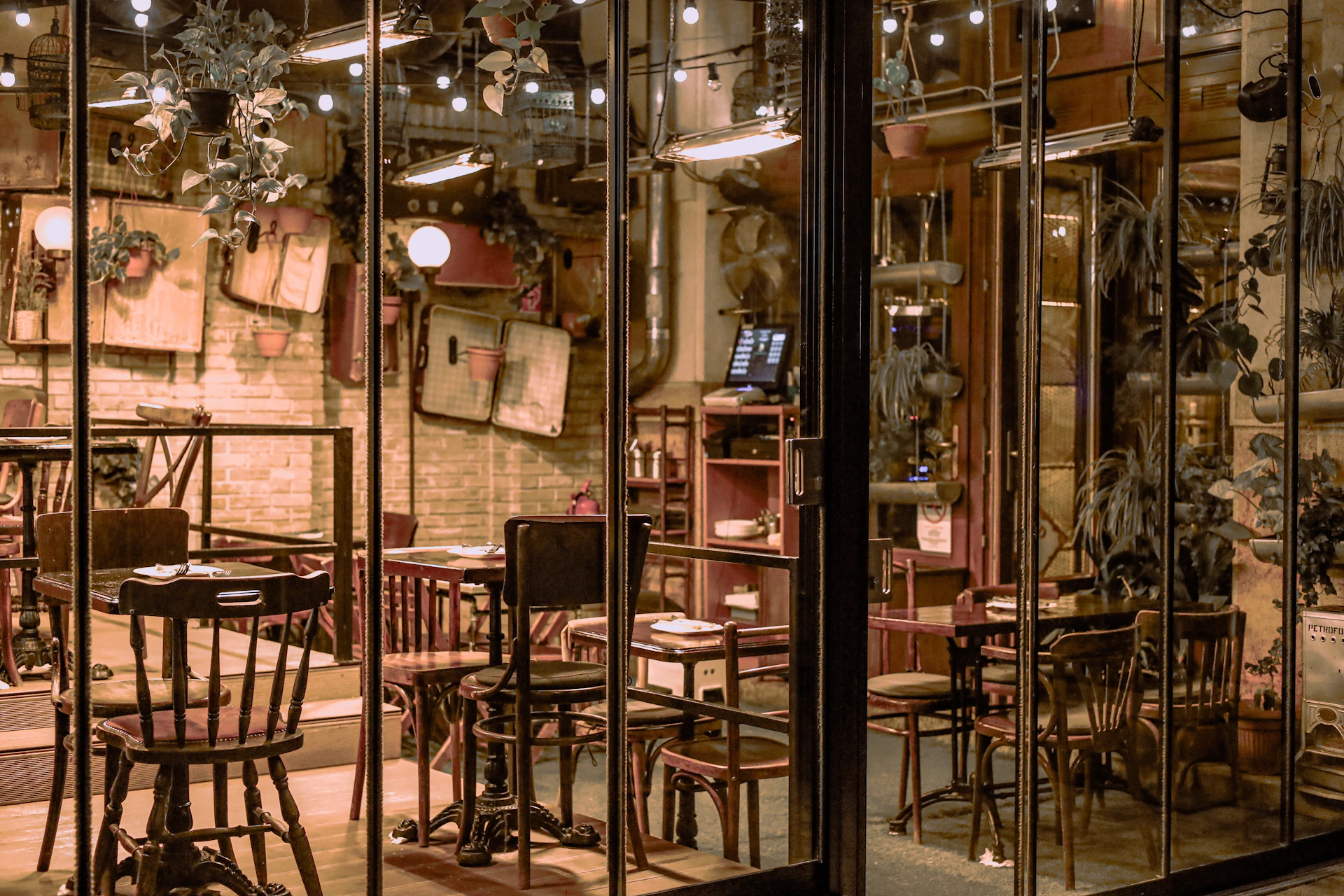 a restaurant with tables and chairs inside of it