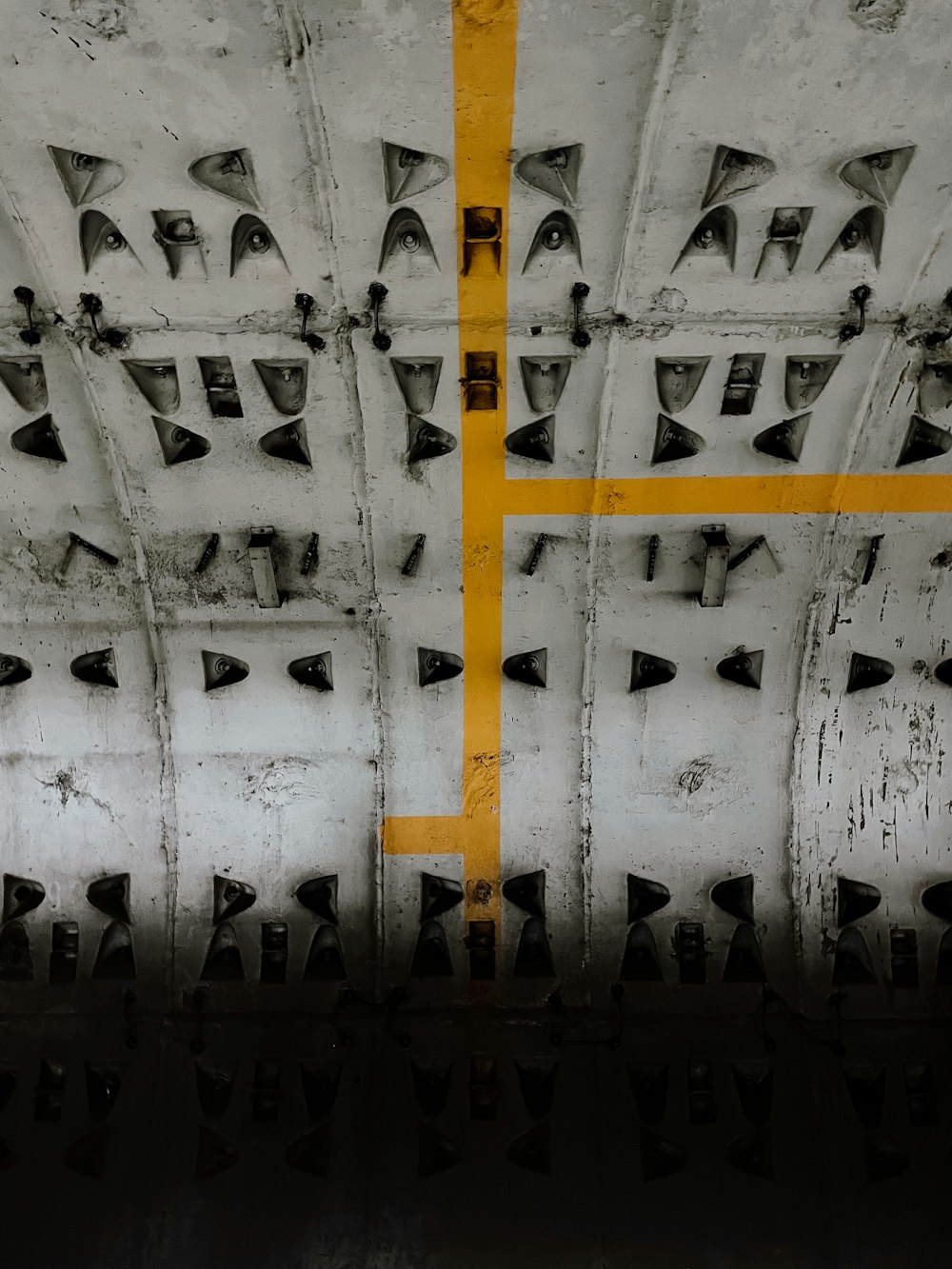 a close up of a yellow line on the side of a plane