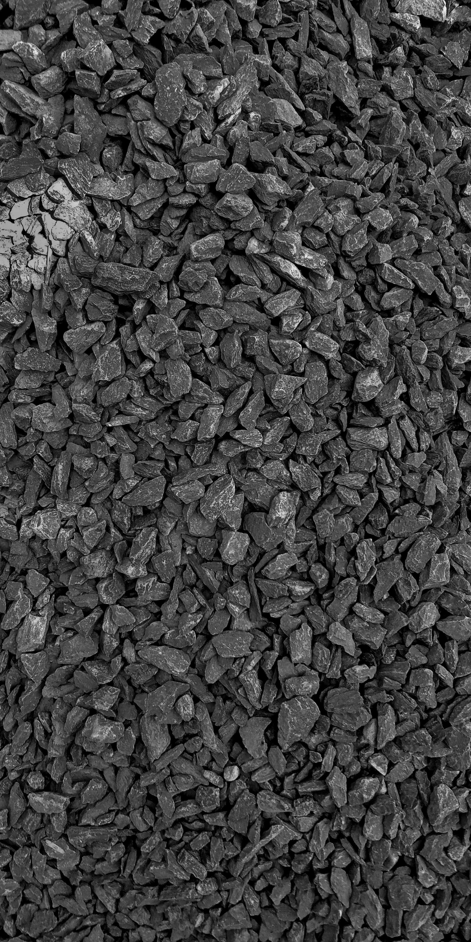 a black and white photo of a pile of rocks