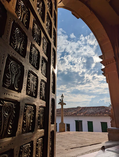a view of a building through an open door