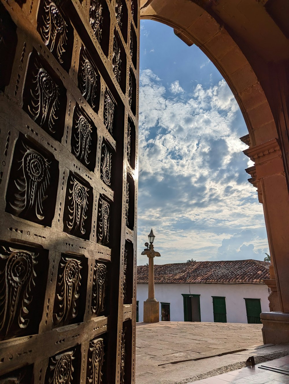 a view of a building through an open door