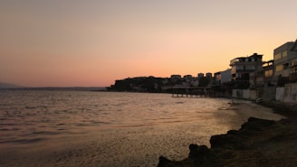 A quiet view of Angina Hill overlooking the ferry terminal parking area on Macleay Island at sunset.