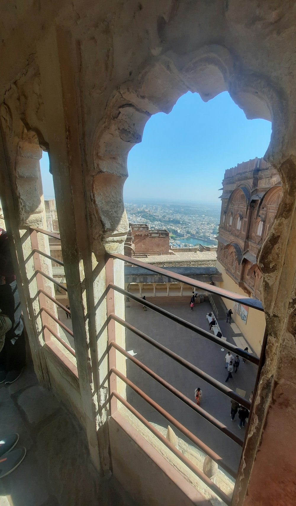 a view of a city from a window in a building