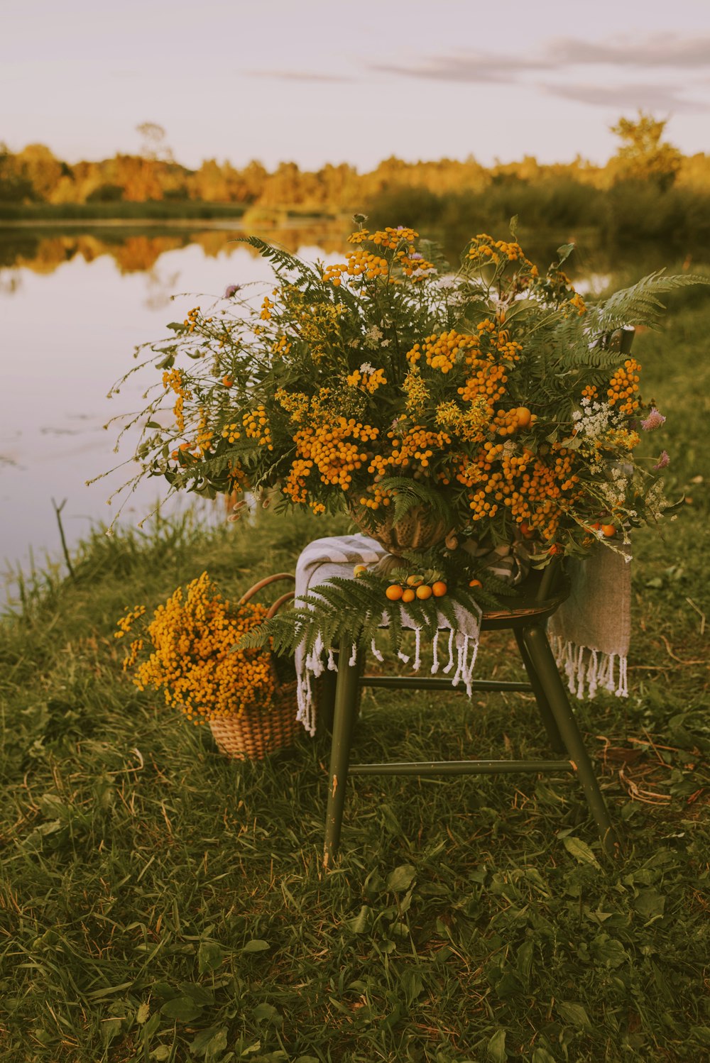 a chair with a bouquet of flowers on it