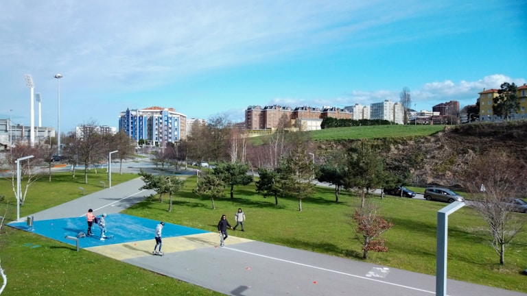 A group of children playing together in a park.