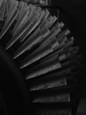 a black and white photo of a large metal object