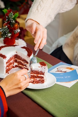 A happy couple sharing a slice of cake during a special celebration.