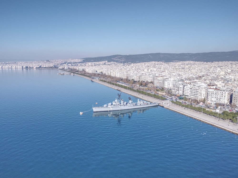 a large boat floating on top of a large body of water