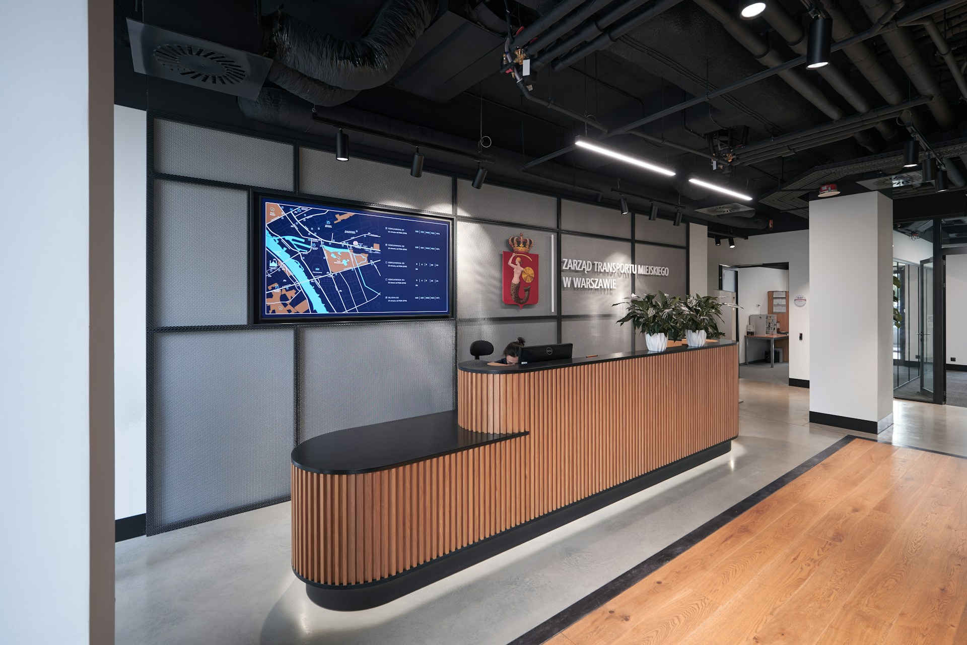 a reception area with a wooden reception counter