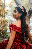 Anija wearing her enchanted dress, glowing softly in a whimsical forest setting.